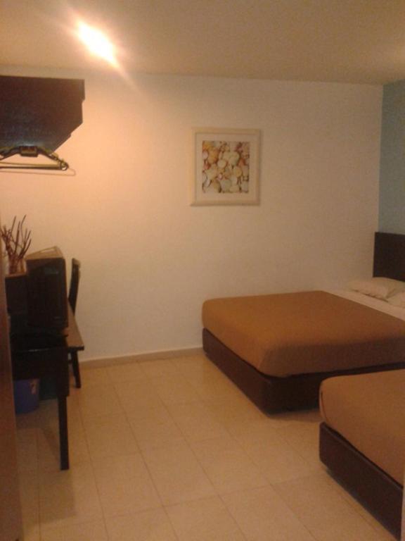 Hotel Ria Johor Bahru Szoba fotó